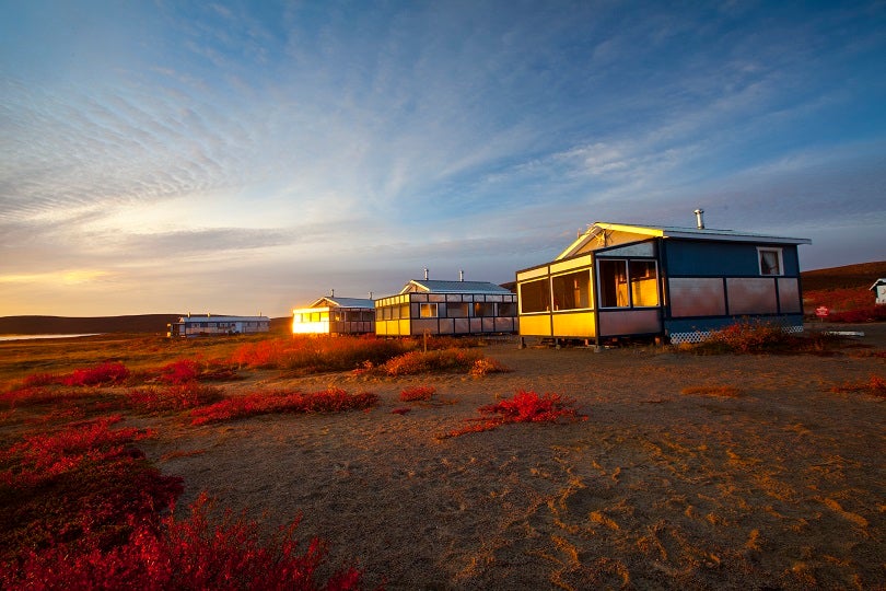 Sunrise in autumn guest cabins
