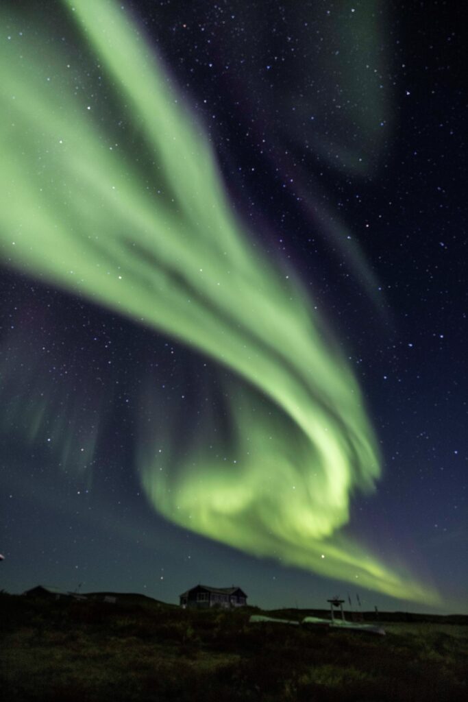 Northern Lights Swooping over NWT Aurora Lodge